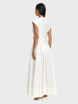 Mannersly's ivory maxi dress, characterized by its sophisticated style and flowing fabric, suitable for various occasions.