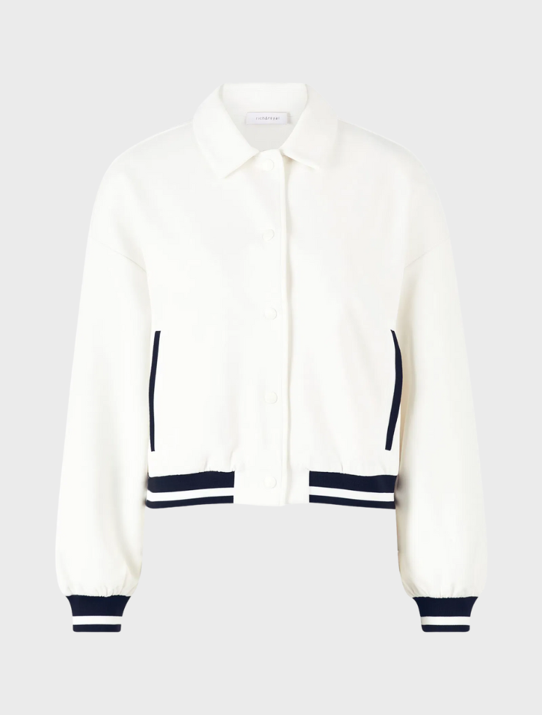 White cropped jacket featuring navy stripes.