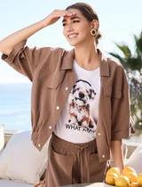 Stylish model showcasing a mocca jacket with a regular fit, elastic hem, and ¾ sleeves, ideal for modern looks.