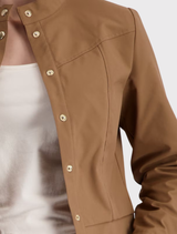 Chic cropped trench jacket in mocca, designed with a stand-up collar, snap button closure, and elegantly detailed sleeves.