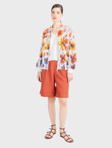 Jacquard bomber jacket in white and coffee with a floral pattern, made from lightweight cotton for breathability and layering.