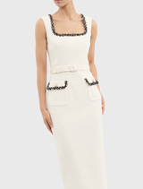 Elegant cream midi dress with square neckline, fitted bodice, back split skirt, and pearl buttons, perfect for versatile styling.