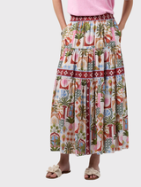 Jaffna Skirt in bone multi offers a tiered design with gathered layers, contrast prints, and an elastic waistband for easy wear.
