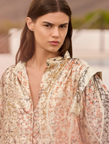 Elegant multicolor shirt with a metallic sheen, structured balloon sleeves, and wide cuffs, perfect for evening occasions.
