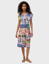 A tiered tea-length dress featuring a floral Armeria scarf, showcasing a stylish and elegant design for various occasions.