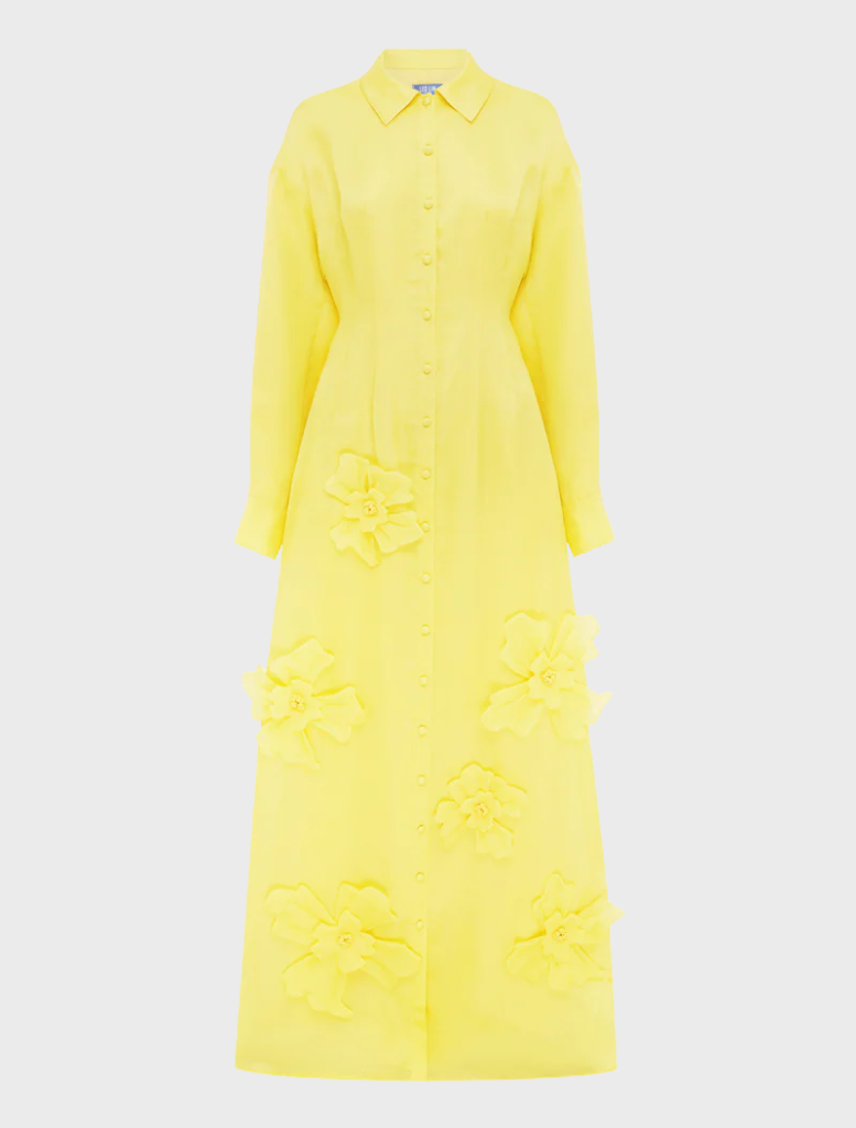 A soft, lightweight yellow dress drapes elegantly, showcasing its vibrant color and comfortable fabric.
