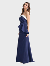 Navy and white striped Jefferson dress featured on a hanger, illustrating its chic and timeless appearance.