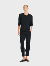 Black jet pants displayed on a white background, showcasing a sleek and modern design suitable for casual or formal wear.