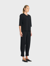 Stylish black jet pants presented, emphasizing their elegant design and suitability for various occasions.