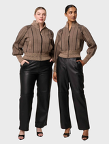 Elegant black straight pants featuring an elasticated waist, crafted from high-quality genuine leather for a sleek look.