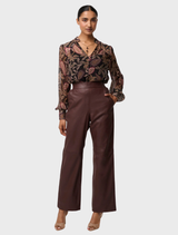 Oxblood straight leg pants by Joan Leather, equipped with an elasticated waist for ease of wear.