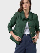 Jungle green jacket made of linen blend, showcasing frayed edges and trim, with seams for a tailored fit. Fully lined.