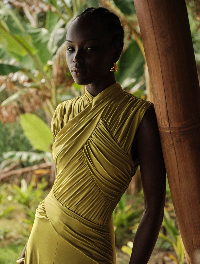 Juniper Gown in Apple color, featuring a flowing design and elegant silhouette, perfect for formal occasions.