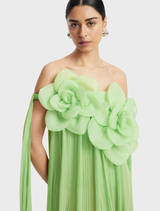 Juniper green dress with a floor-length drape, combining elegance and style for formal wear.