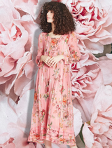 Pink floral dress with a fitted silhouette, featuring short sleeves and a knee-length hem, perfect for casual outings.
