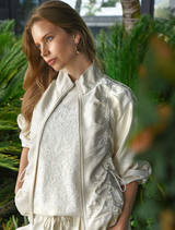 Cream cotton t-shirt with a delicate lace overlay, designed for comfort and a refined look in everyday fashion.