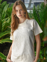 Cream t-shirt with soft lace overlay, offering a delicate contrast and feminine touch for everyday wear.
