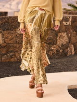 A sunny yellow skirt showcasing a comfortable fit, great for everyday fashion.