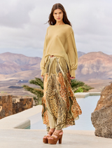 A bright yellow skirt with a flowing design, perfect for casual or summer wear.