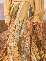 A cheerful yellow skirt with a lightweight fabric, suitable for various occasions.