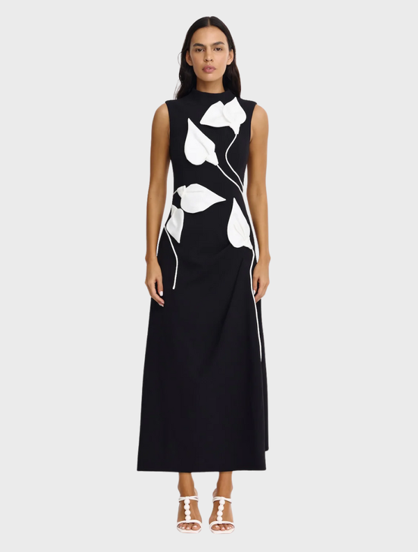 Black and ivory Kadence midi dress featuring a stylish design, perfect for various occasions.