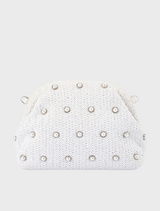 A white clutch bag adorned with silver studs, showcasing a stylish and modern design.