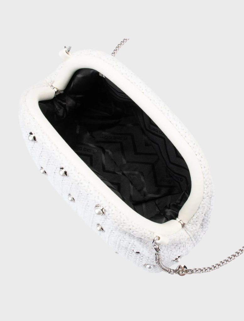 A sleek white clutch bag with silver studs, combining sophistication and contemporary style.