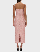 Karter Dress in a soft rosewater color, featuring a flowing design and elegant silhouette.