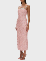 Soft rosewater Karter Dress, embodying elegance with its flowing fabric and chic design.