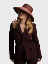 Elegant rose pink racewear hat with contrasting details and internal cord, perfect for adding drama to any outfit.