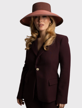 Kartia Racewear Droop Hat in rose pink, showcasing a structured silhouette and contrasting details for a fashionable statement.