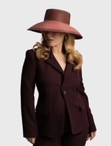 Rose pink Kartia Racewear Droop Hat with structured shape and contrasting color detailing, ideal for stylish outfits.