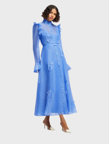 Elegant azure midi dress with butterfly sleeves and decorative appliqué, perfect for various occasions.