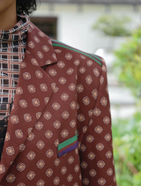  Relaxed russet multi jacket with contrast detailing, flap pockets, and full lining, ideal for a stylish coordinated outfit.