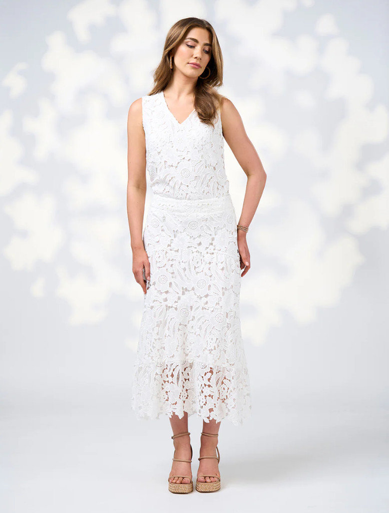 Elegant white lace Keira Top made from soft, lightweight fabric, perfect for a stylish and comfortable outfit.