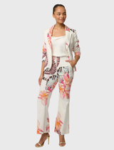 Nautilus Bloom Kelsey Blazer combines linen and stretch for comfort, featuring a tailored design, jet pockets, and button cuffs.