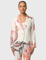 The Nautilus Bloom Kelsey Blazer merges linen with stretch for enhanced comfort, showcasing a tailored style, jet pockets, and buttoned cuffs.