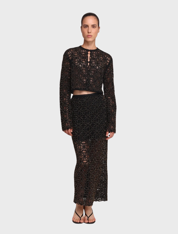 Black Kenny jacket displayed on a hanger, featuring a sleek design and modern cut suitable for casual or formal wear.