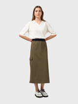 Khaki cavalry skirt laid flat, showcasing its structured design and flared hem, ideal for casual or formal wear.