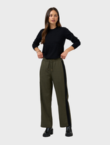 Khaki tactical pants presented, highlighting their functional pockets and sturdy construction for tactical wear.