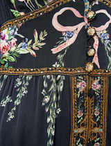 Elegant kimono-sleeve dress with intricate shirring detail, perfect for a sophisticated look.