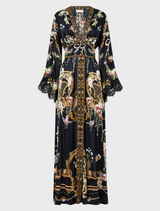 Stylish kimono-sleeve dress adorned with shirring detail, combining traditional and modern fashion elements.