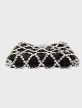 Black and white Kit Crystal Cage Bag with a chain strap, combining elegance and modern design in one accessory.