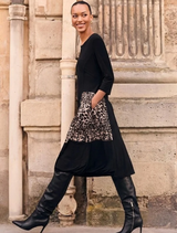 Stylish A-line midi dress in camel and black with animal print, round neck, 3/4 sleeves, and pockets for versatile wear.