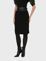 Black knit skirt by Frank Lyman, featuring a tailored silhouette and comfortable pull-on design for versatile styling.