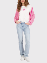 Stylish tweed cardigan featuring a round neckline, cropped design, and fringed ribbed hem for a chic spring look.