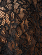 Elegant black floral lace top with a mock neckline, scalloped cap sleeves, and an invisible zipper at the back.