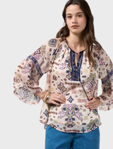 Floaty blouse with flared sleeves, shirred shoulders, and contrast panels, made of 100% viscose for a flattering fit.