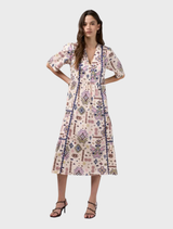 Bone multi printed midi dress featuring gathered tiers, flat center front panel, contrast piping, and elasticated back waist.