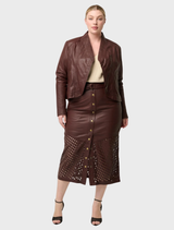 Oxblood leather midi skirt with custom laser detailing, designed for a contemporary and elegant style.